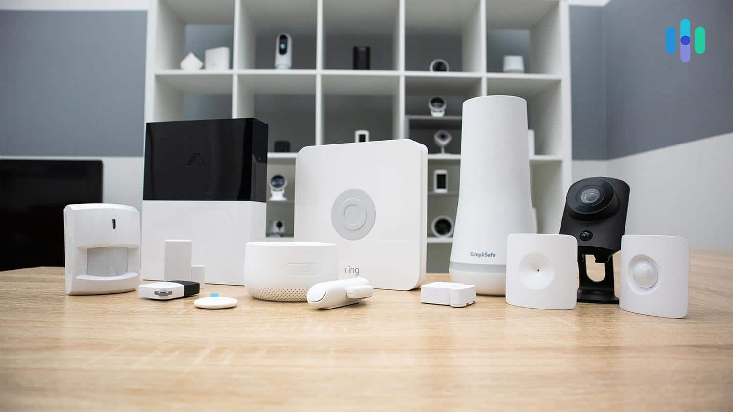 Abode, Ring Alarm, and SimpliSafe security systems side-by-side Abode, Ring Alarm, and SimpliSafe security systems side-by-side