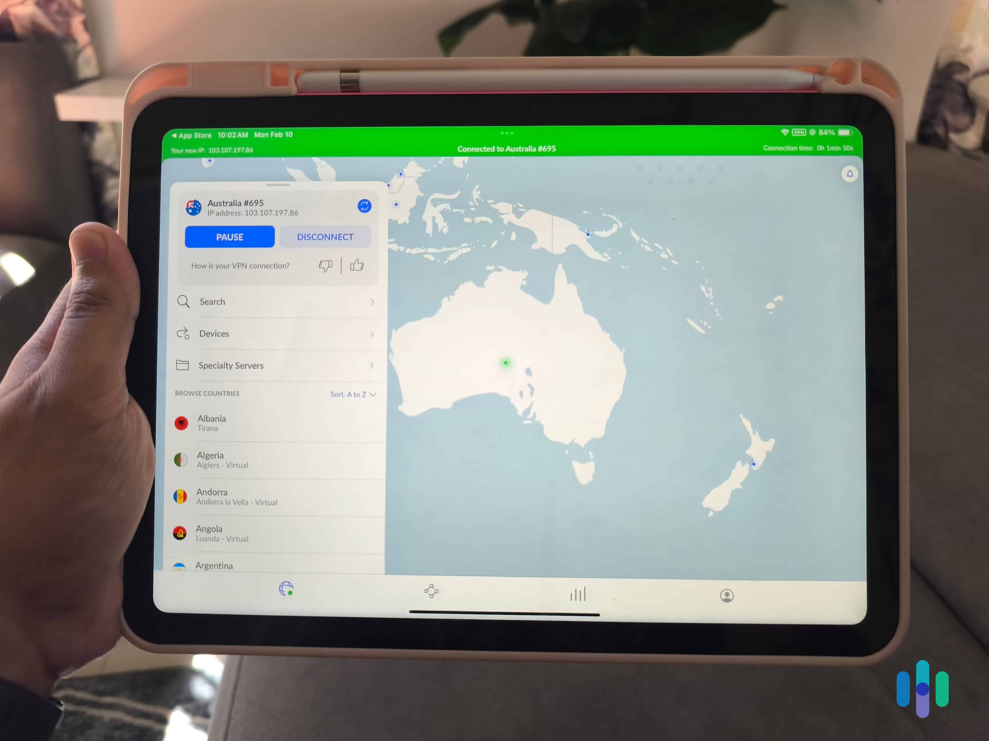 Our tester holding up an iPad connected to NordVPN’s Australia server Our tester holding up an iPad connected to NordVPN’s Australia server